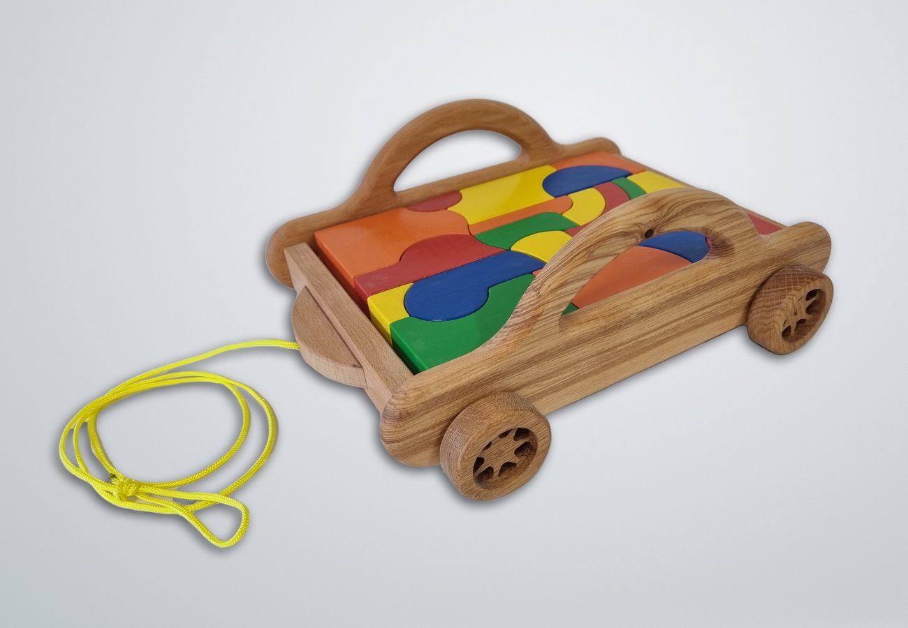 Puzzle-Wagen (bemalt oder nature), B 35 cm, B 29, H 14 cm Hergestellt in St. Urban, Patientenarbeit